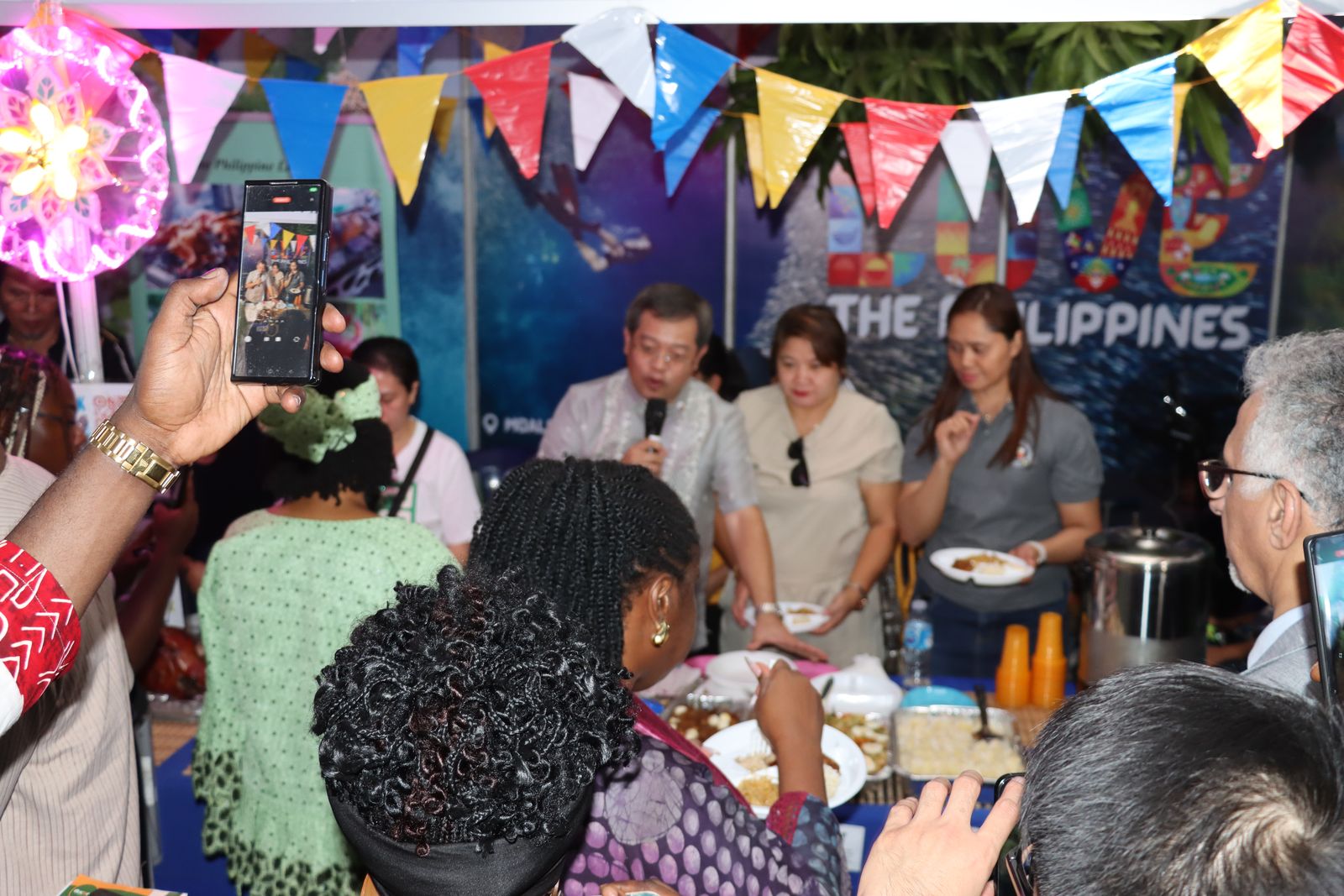 Guests at a CMDFOODTOUR country stand